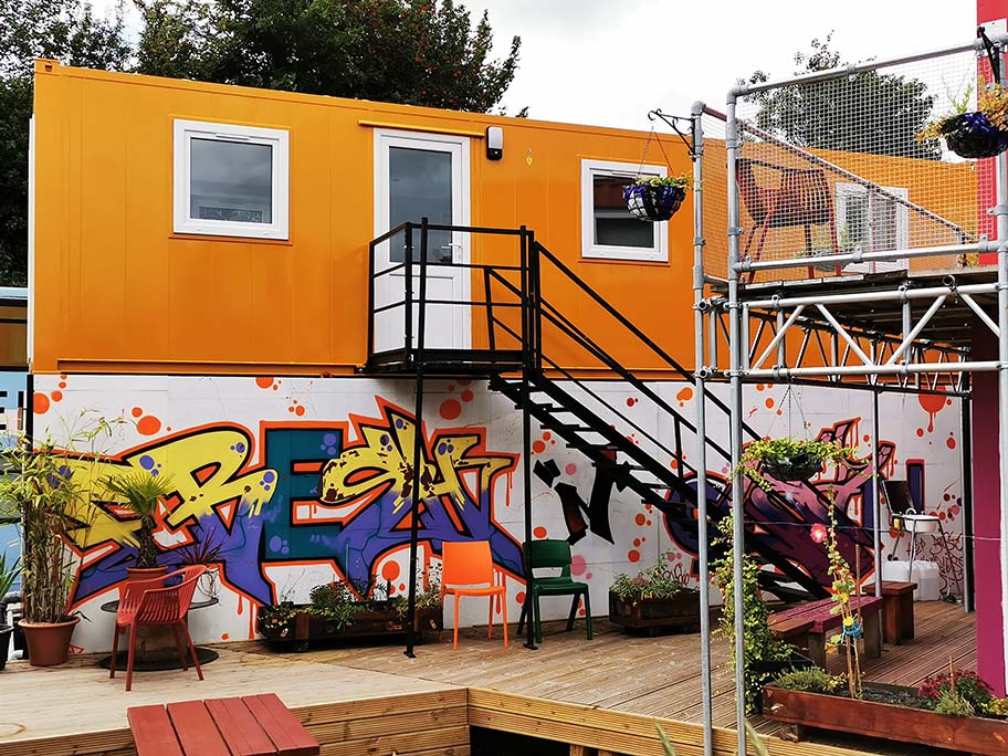 hbh enviroment orange unit on top of graffiti